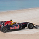 Illustration for article titled F1 Car + Beach = Epic Donuts
